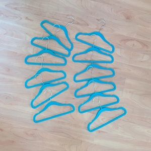 12 velveted kids hangers in like new condition-barely used!